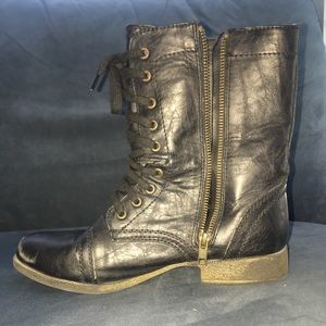 Black leather combat boots